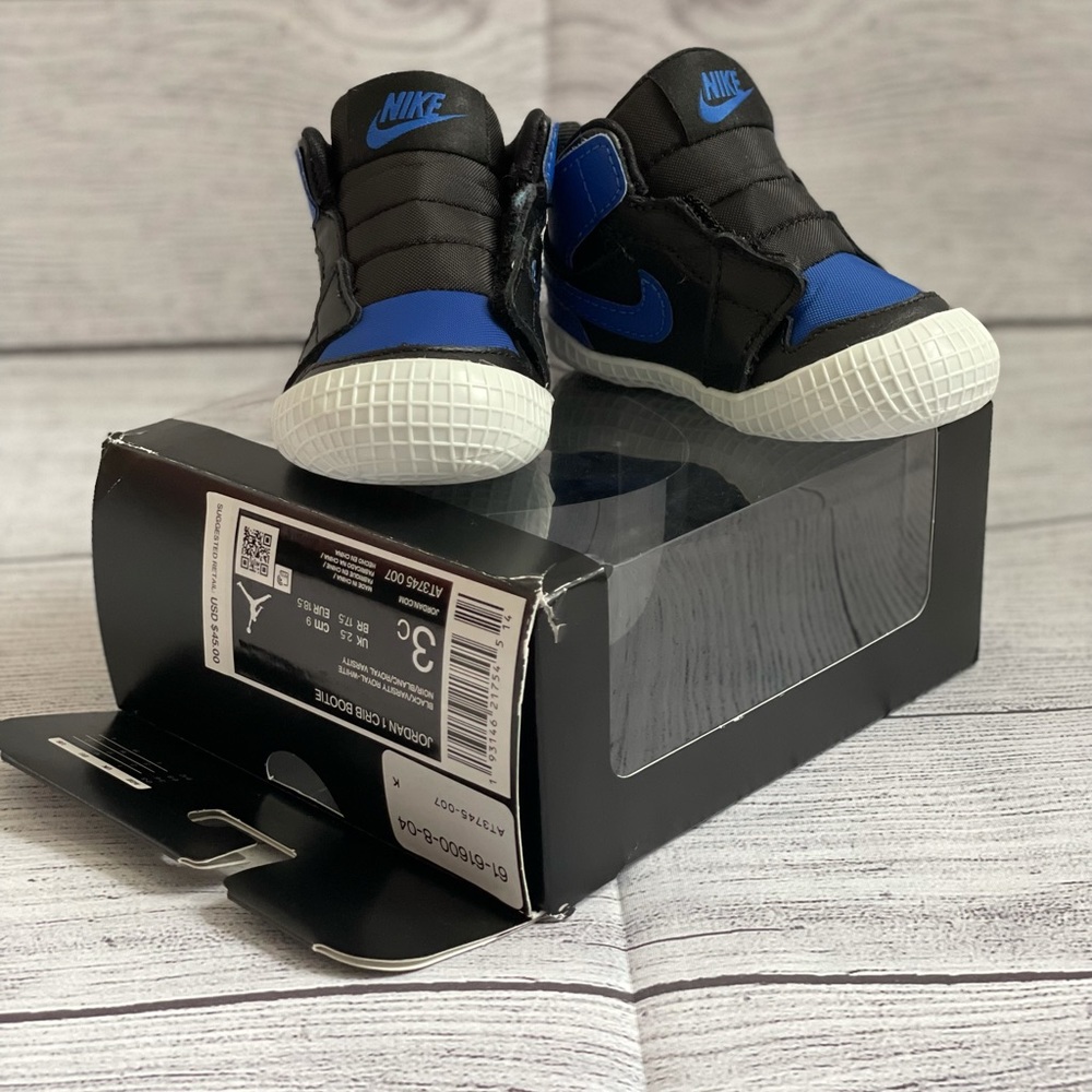 Jordan 1 crib bootie in blue & black. Size 3C.